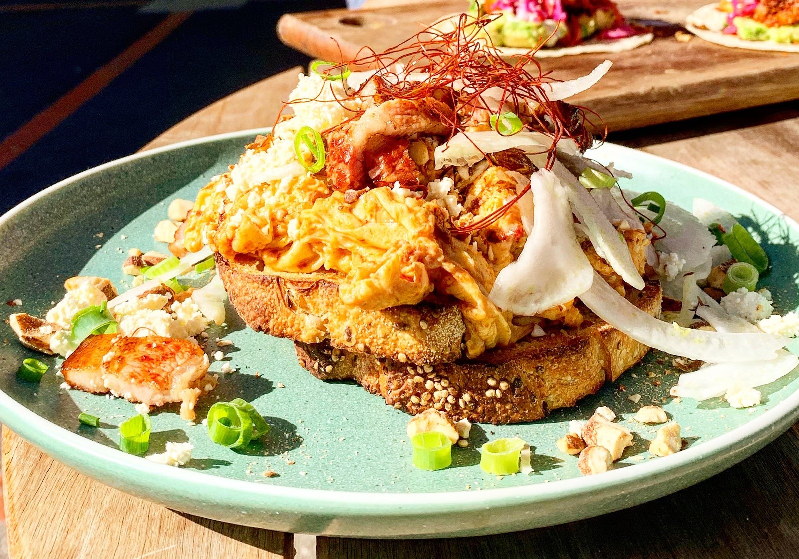 "A plate of chilli scrambled eggs"